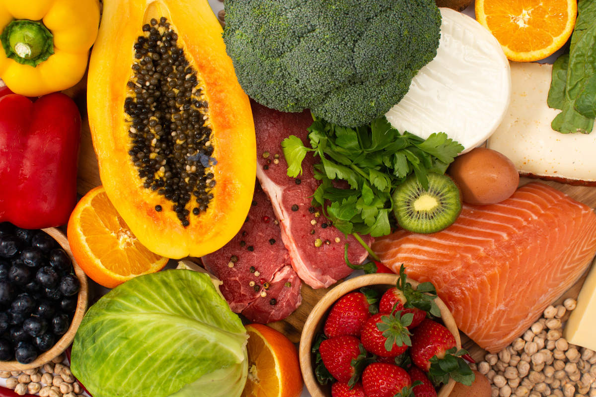 various fruits, vegetables, meats in a pile
