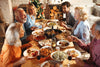 family gathered around the table for Thanksgiving dinner.