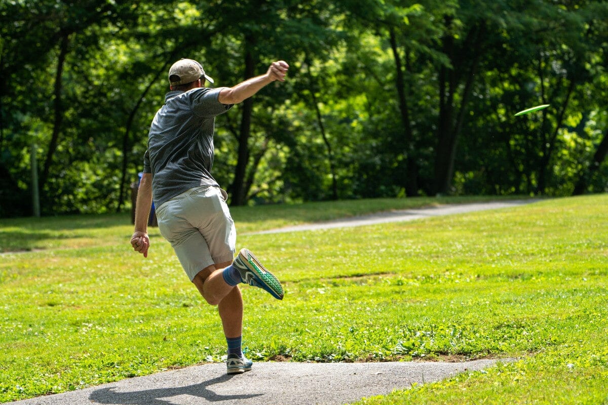 Man playing frisbee golf.