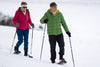 senior couple snowshoeing.